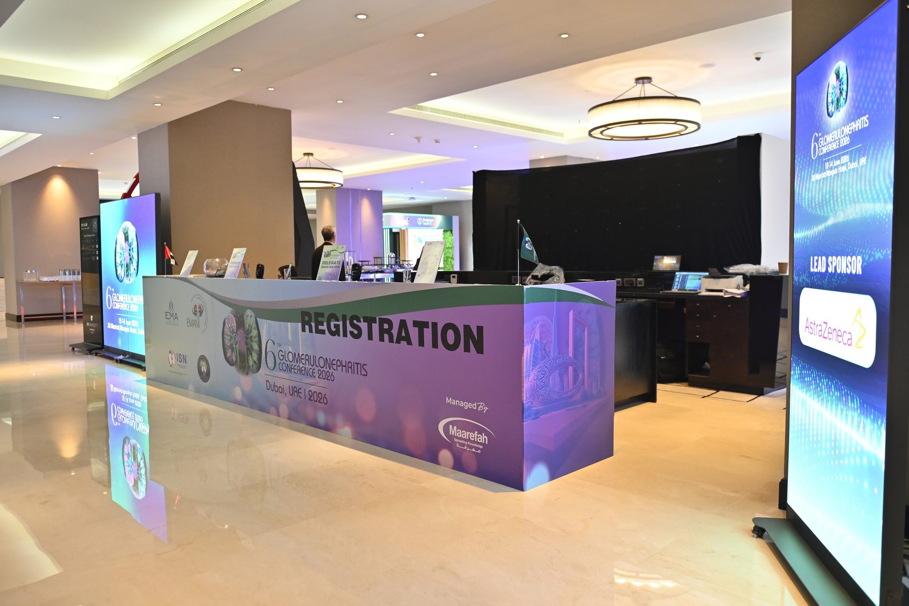 Pixanova LED roll-up screens either side of the conference registration desk