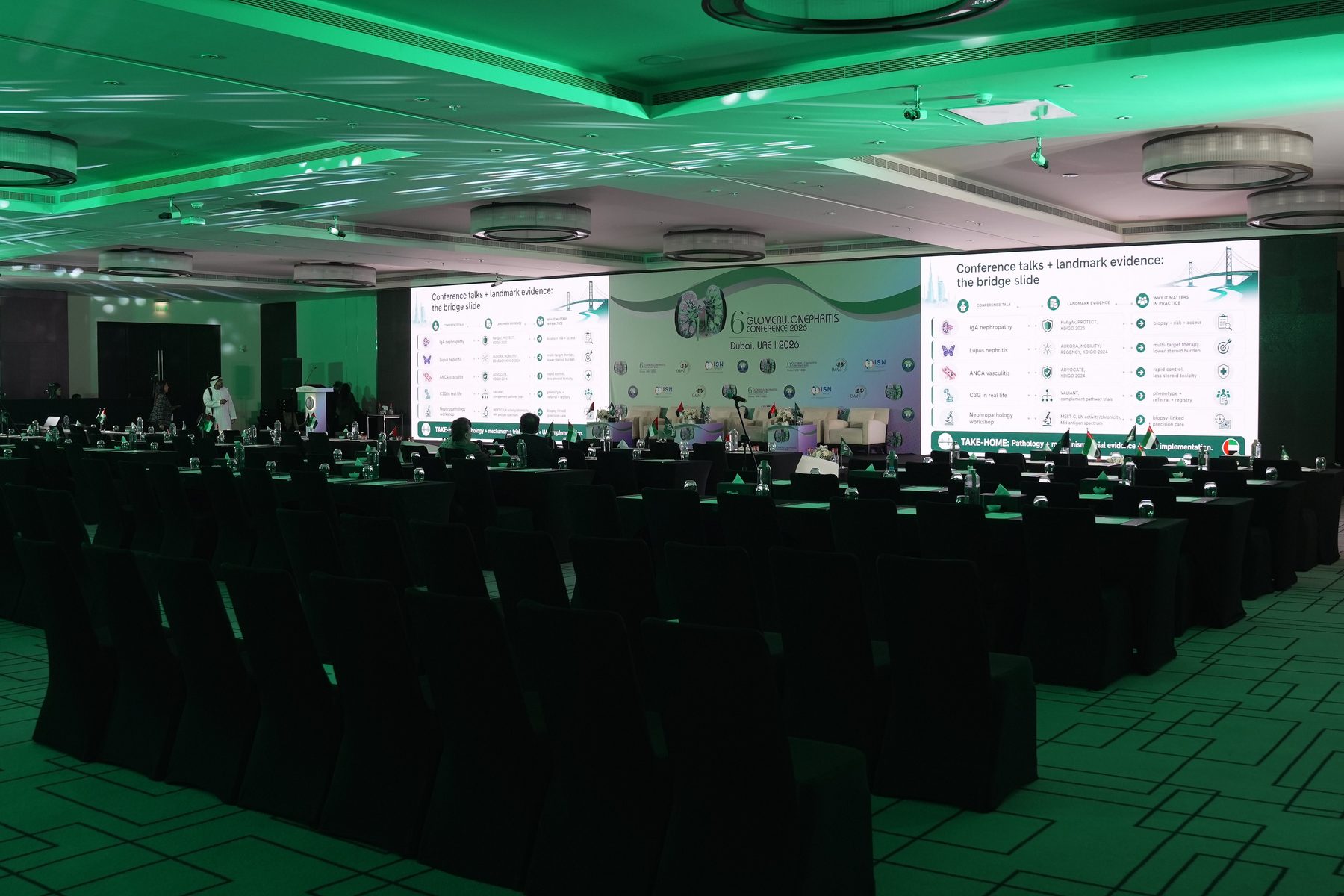 Twin Pixanova LED screens flanking the main stage in the conference ballroom