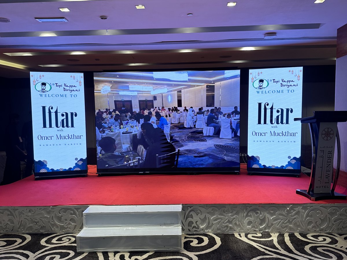Pixanova LED roll-up screens either side of a linked LED wall on stage at the Iftar event, Lavender Hotel Dubai