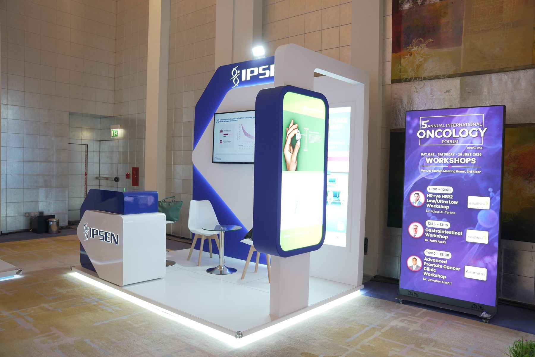 Pixanova portable LED roll-up screen on the exhibition floor beside an exhibitor stand
